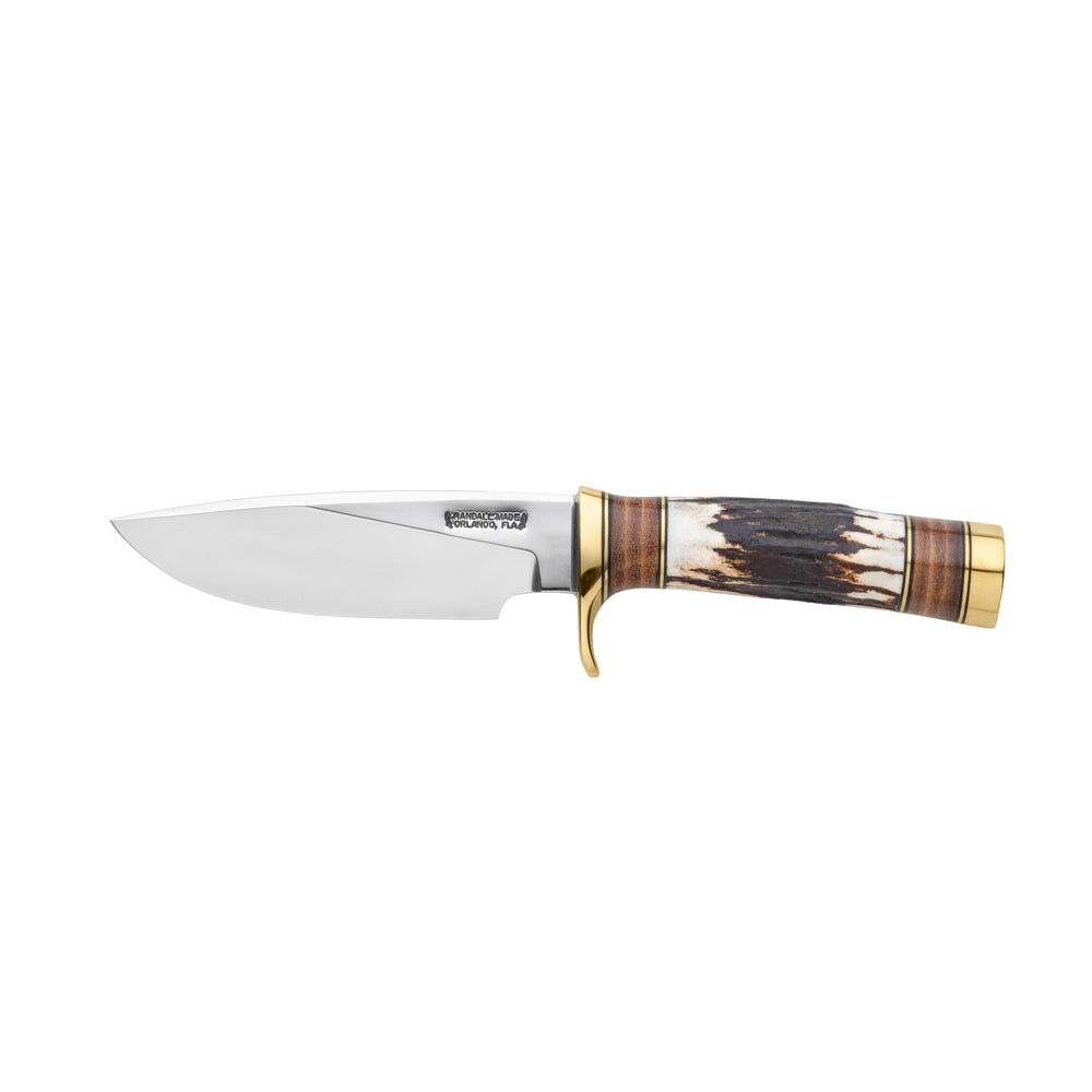 RandallMade Trapper in Brass with a 5-inch blade